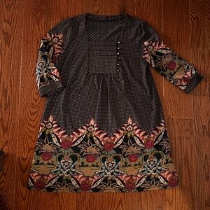 Navy cotton poly blend dress with eastern print detail.